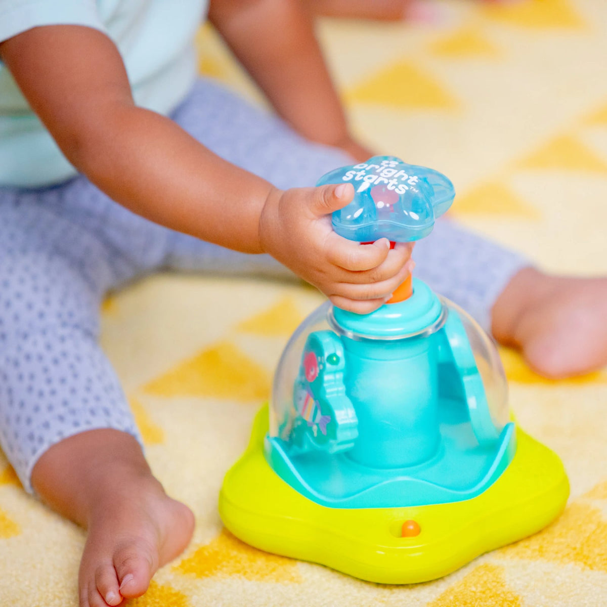 Bright Starts Press Glow Spinner μουσικό παιχνίδι 6m+
