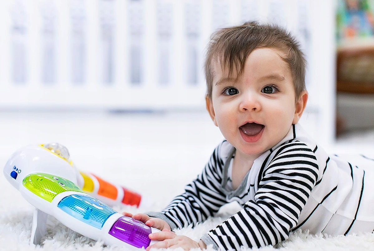 BABY EINSTEIN φωτεινό πάνελ με κουδουνίστρα, μελωδίες και λέξεις σε 3 γλώσσες