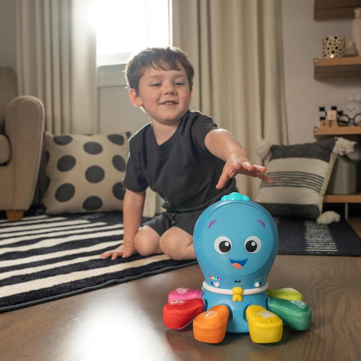 BABY EINSTEIN interaktywna OŚMIORNICA frazy melodie światła ruch 4 języki