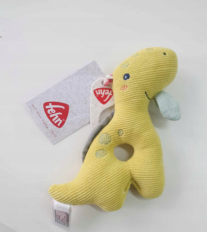 FEHN Happy Dino grzechotka chwytak dla niemowląt 16cm, żółty pluszowy dinozaur z opakowaniem