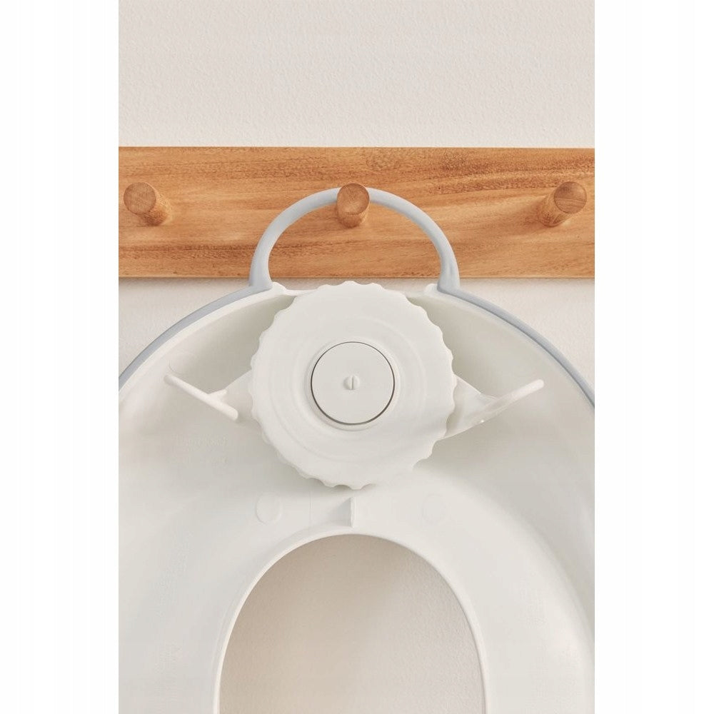 Adaptor BABYBJORN pentru toaletă, cu reglare și orificiu, 12 x 18,5 cm
