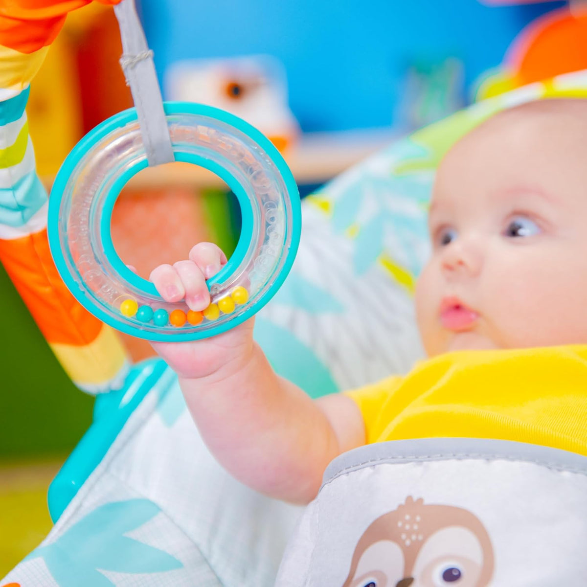 BRIGHT STARTS Rainforest bouncer with vibrations and melodies