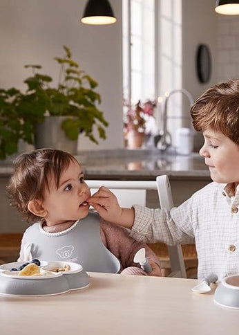 BABYBJORN σαλιάρα σιλικόνης με τσέπη x2