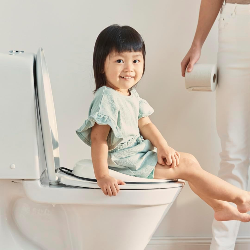 Adaptor BABYBJORN pentru toaletă, cu reglare și orificiu, 12 x 18,5 cm