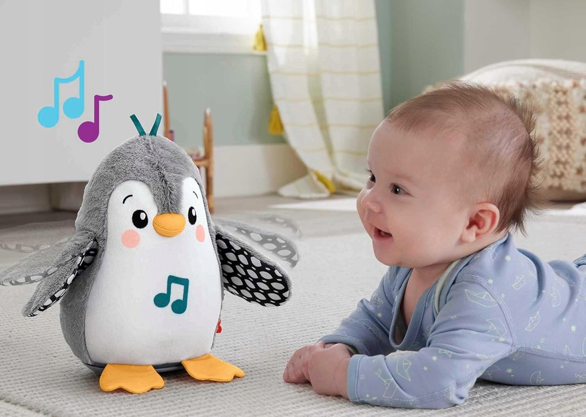 FISHER-PRICE HNC10 kiwający się pingwin z melodiami 21 cm